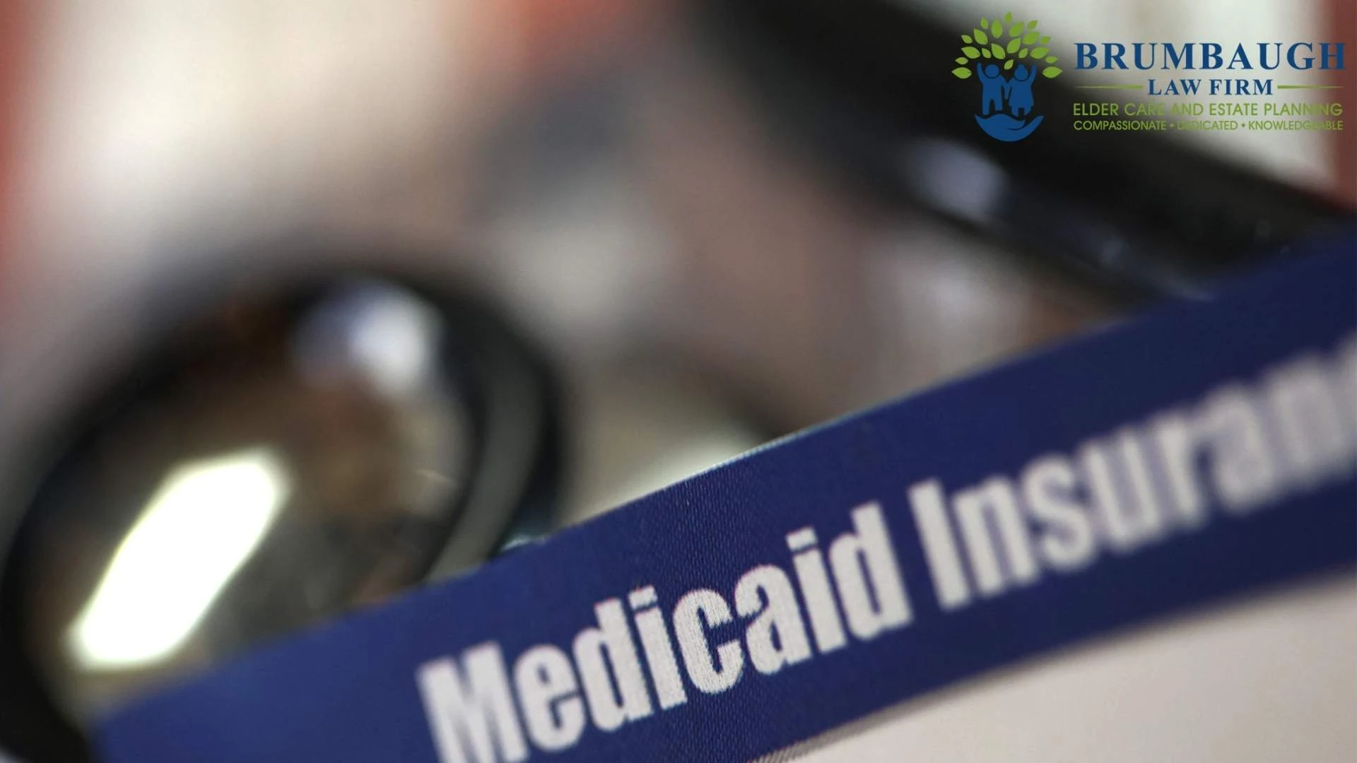 Medicaid car insurance paperwork and law firm logo