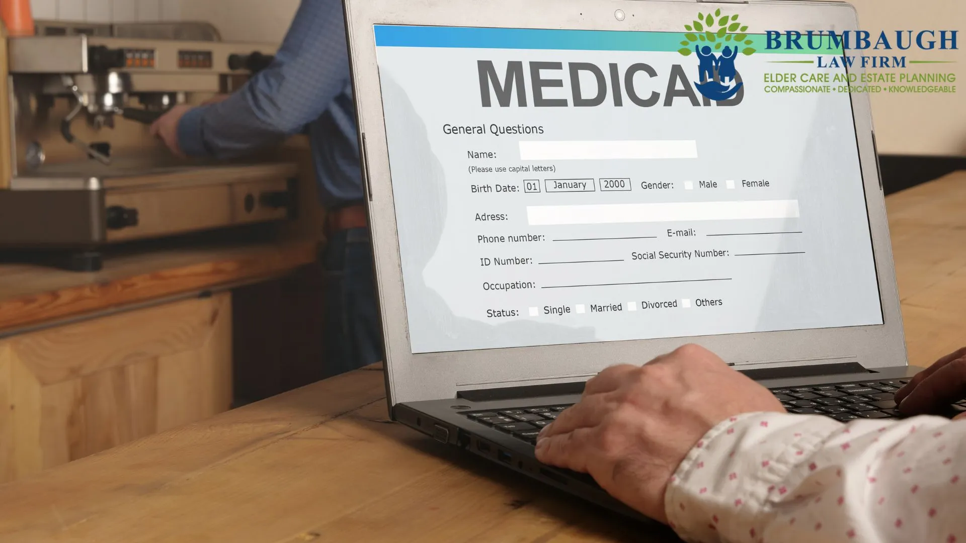 Person completing Medicaid online form on laptop after approval in ohio in 2026