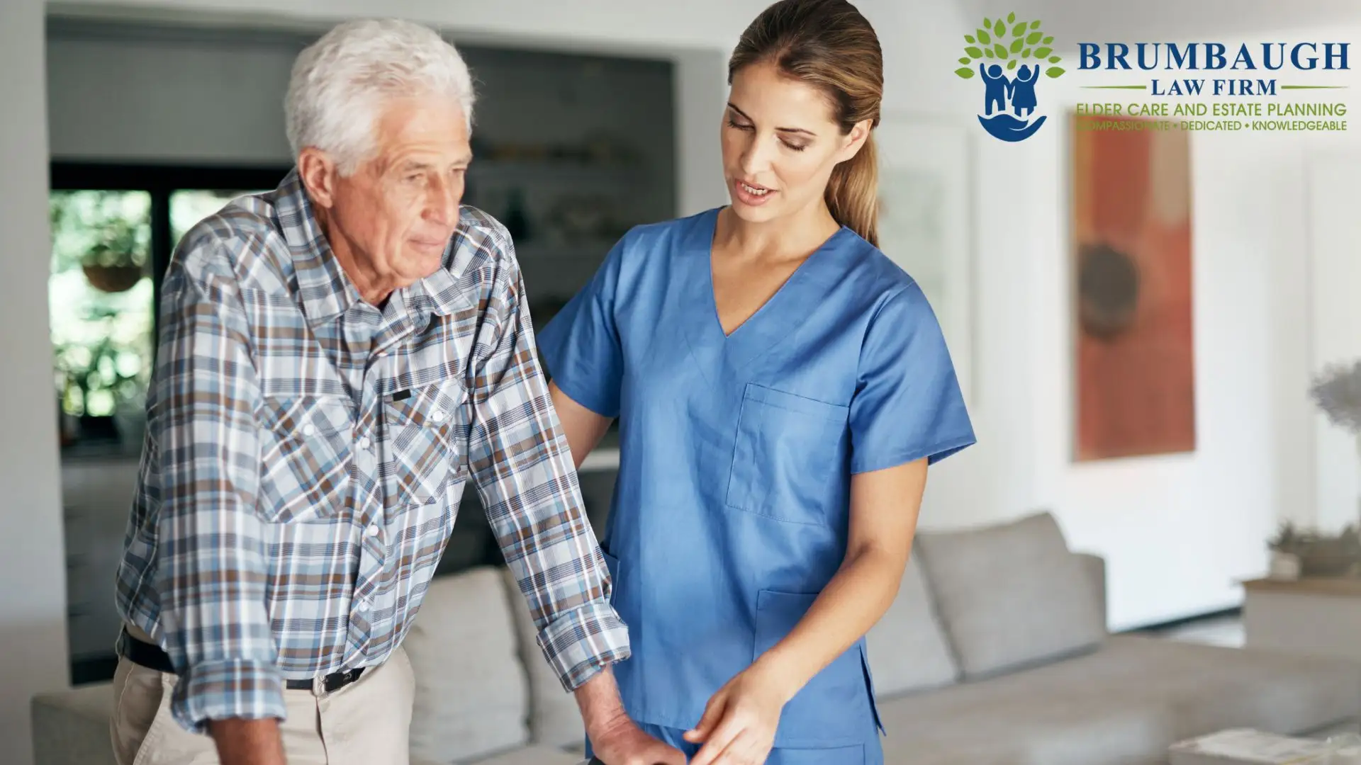 Caregiver assisting elderly man with walking
